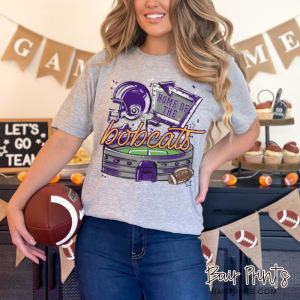 Customizable game day t-shirt with football stadium, helmet, and ‘Home of the Bobcats’ design. Personalize with your team mascot and school colors